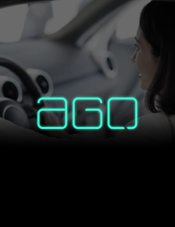 Glowing aGO wordmark over a dark car interior