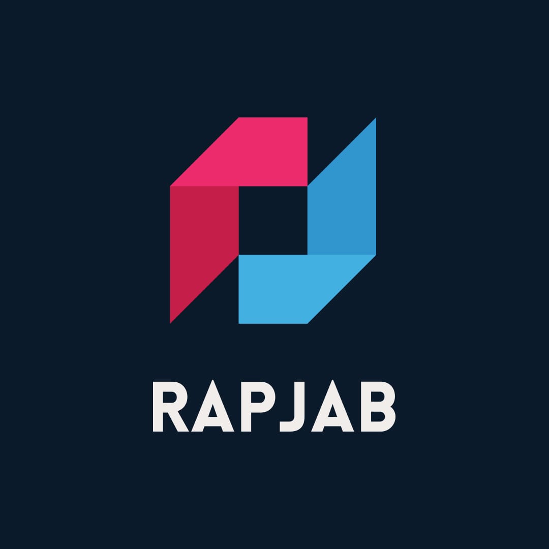 RAPJAB logo exploration with pink and blue folded shapes on navy